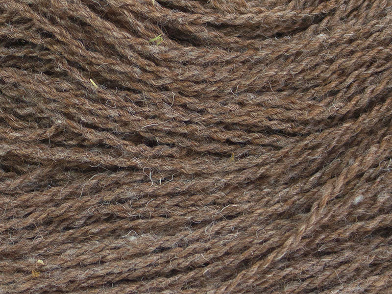 A close-up view of Oxide, a yarn produced by Gothfarm Yarn from a custom blend of alpaca fleece and Jacob sheep wool.
