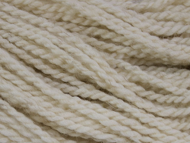 A close-up view of strands of Tallow, a yarn made from California Red Sheep wool by Gothfarm Yarn.
