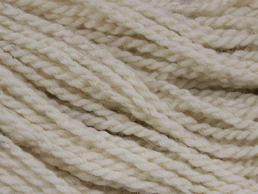 A close-up view of strands of Tallow, a yarn made from California Red Sheep wool by Gothfarm Yarn.